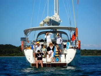Family sitting on the yacht