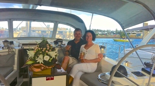 Champagne and flowers  on  Sailing Yacht Curlew Escape, available for private yacht charters on Moreton Bay, Brisbane.