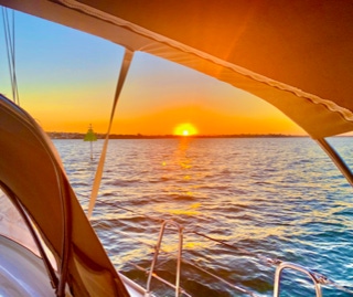 Sunset on a sunset sail on a private yacht charter on Curlew Escape, Moreton Bay, Brisbane.