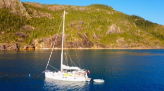 Aerial view of the moored Sailing Yacht Curlew Escape, available for private yacht charters on Moreton Bay, Brisbane.