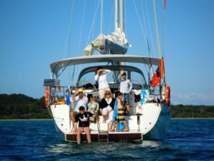 Family sitting on the yacht